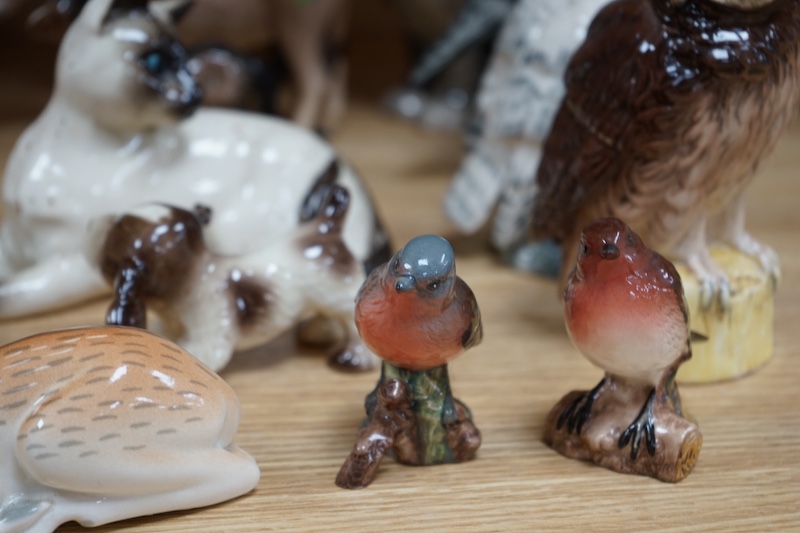 A collection of Russian, Beswick, Doulton and other animal ornaments. Condition - varies